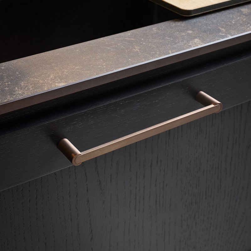 Handtag Flow - Brunerad mässing