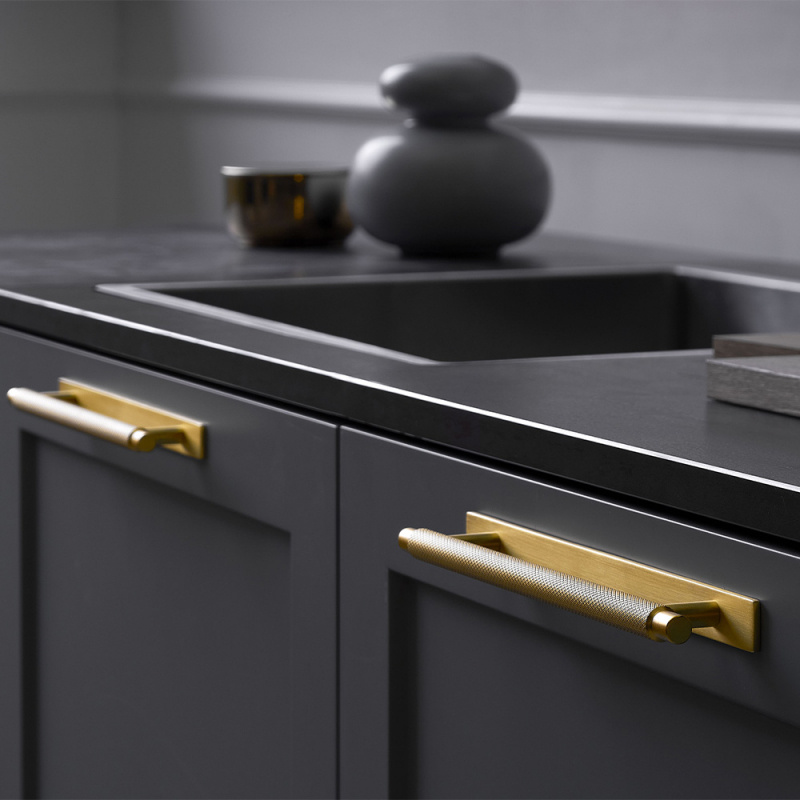 Handtag Manor - Bricka - Guld